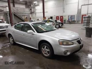 2004 Pontiac Grand Prix GT2 z VIN 2G2WS522641126247, wystawiony jako IAAI lot #42338014 z przebiegiem 236 735 mil mil oraz . Historia ofert i sprzedaży dostępna na DreamBid. Obrazek 1.