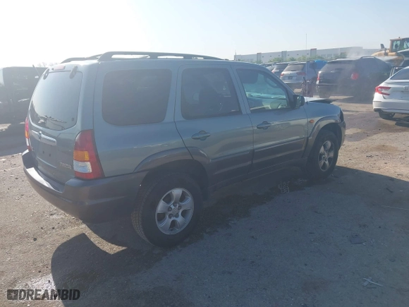 2004 Mazda Tribute ES with VIN 4F2CZ06184KM32333, listed as a IAAI auction lot 42041183 with 33,646 mi miles. Bid and sale history available at carsss.com. Image 4.