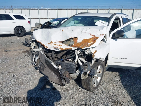 2012 Jeep Compass Latitude with VIN 1C4NJCEA2CD706809, listed as a IAAI auction lot 40956063 with 159,976 mi miles and . Bid and sale history available at carsss.com. Image 6.