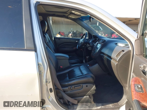 2004 Acura MDX Touring Pkg w/Navigation with VIN 2HNYD18804H546977, listed as a IAAI auction lot 41345964 with 161,856 mi miles. Bid and sale history available at carsss.com. Image 5.