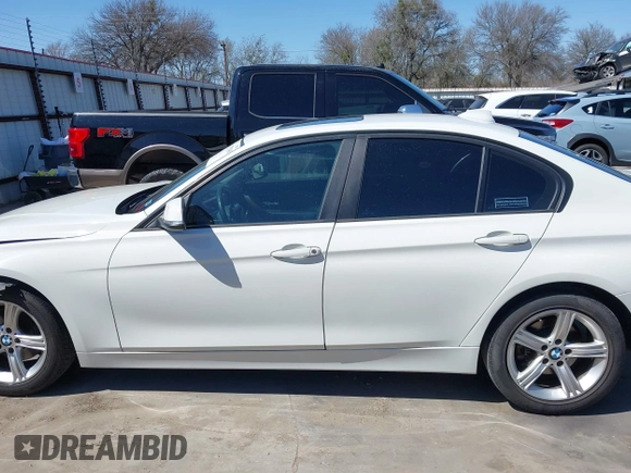 2015 BMW 3 Series 320i with VIN WBA3B1C53FK138341, listed as a IAAI auction lot 41757490 with 125,280 mi miles. Bid and sale history available at carsss.com. Image 14.