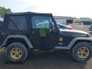 2006 Jeep Wrangler Sport z VIN 1J4FA49S06P721223, wystawiony jako IAAI lot #42654272 z przebiegiem 225 223 mil mil oraz . Historia ofert i sprzedaży dostępna na DreamBid. Obrazek 13.