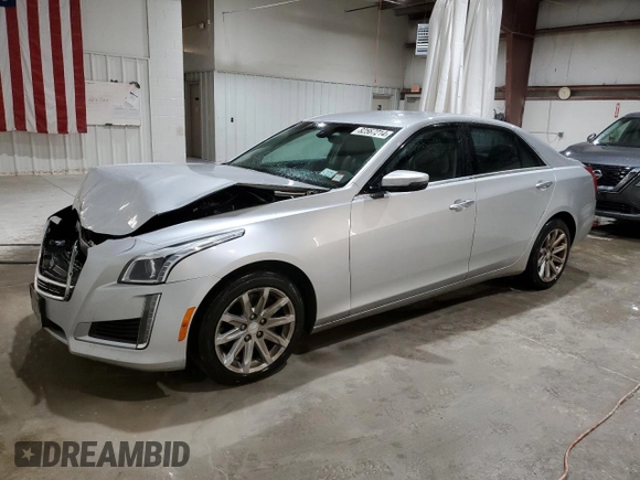 2015 Cadillac CTS AWD with VIN 1G6AW5SX2F0111350, listed as a Copart auction lot 82567214 with 116,936 mi miles and Salvage title. Bid and sale history available at DreamBid. Image 1.
