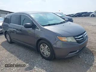 2014 Honda Odyssey LX z VIN 5FNRL5H27EB007683, wystawiony jako IAAI lot #42427304 z przebiegiem 325 359 mil mil oraz . Historia ofert i sprzedaży dostępna na DreamBid. Obrazek 1.