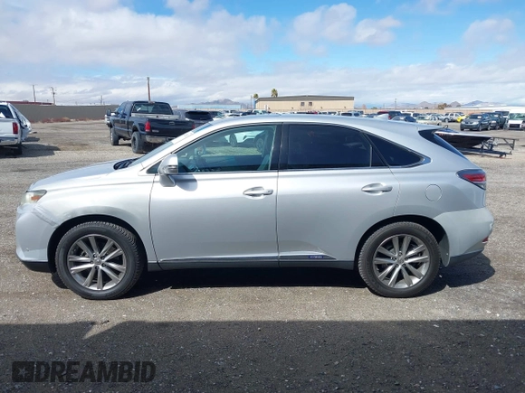 2015 Lexus RX 450h with VIN 2T2ZB1BA4FC002602, listed as a IAAI auction lot 41812562 with 166,220 mi miles and . Bid and sale history available at DreamBid. Image 14.