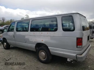 1999 Ford Econoline Passenger XL with VIN 1FBSS31LXXHA39417, listed as a Copart auction lot 52817645 with 109,930 mi miles and Salvage title. Bid and sale history available at DreamBid. Image 2.