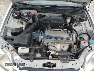 1998 Honda Civic DX z VIN 2HGEJ644XWH120512, wystawiony jako Copart lot #59639345 z przebiegiem 76 588 mil mil oraz Czysty tytuł • Clean title. Historia ofert i sprzedaży dostępna na DreamBid. Obrazek 11.