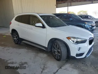 2018 BMW X1 sDrive28i z VIN WBXHU7C34J5L08947, wystawiony jako Copart lot #47344485 z przebiegiem 80 034 mil mil oraz Szkody całkowita. Historia ofert i sprzedaży dostępna na DreamBid. Obrazek 4.