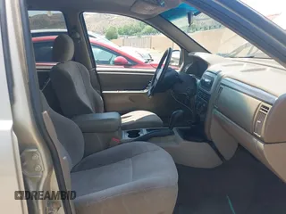 2001 Jeep Grand Cherokee Laredo with VIN 1J4GX48S01C606559, listed as a IAAI auction lot 42384286 with 149,146 mi miles and . Bid and sale history available at DreamBid. Image 5.