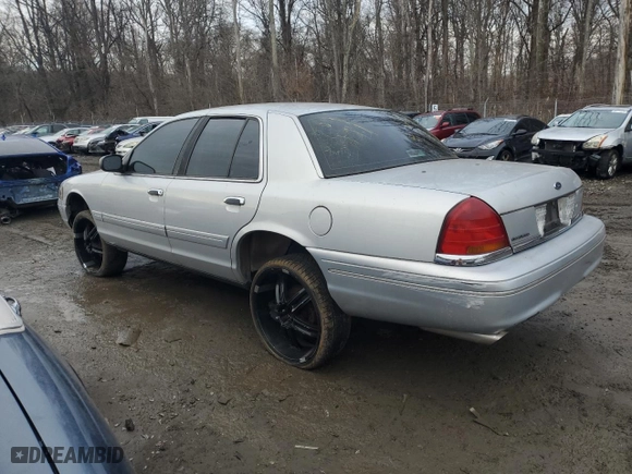 2002 Ford Crown Victoria Police Pkg Police Interceptor with VIN 2FAFP71W52X157860, listed as a Copart auction lot 42335115 with 175,053 mi miles and Salvage Title. Bid and sale history available at carsss.com. Image 2.