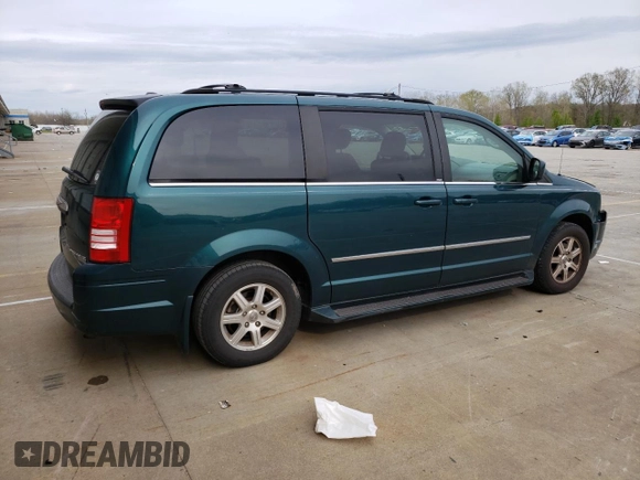2009 Chrysler Town & Country Touring with VIN 2A8HR541X9R536460, listed as a Copart auction lot 52554635 with 109,744 mi miles and Salvage Title. Bid and sale history available at DreamBid. Image 3.