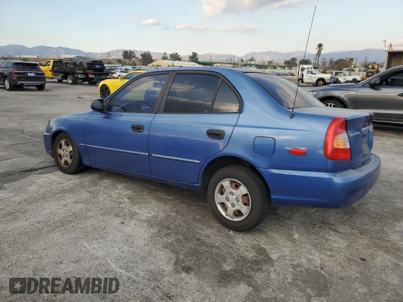 2001 Hyundai Accent GL with VIN KMHCG45C91U195735, listed as a Copart auction lot 80950554 with 164,176 mi miles and Salvage Title. Bid and sale history available at carsss.com. Image 2.