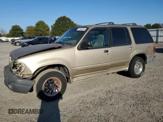 1999 Ford Explorer XL z VIN 1FMZU34X2XUA28059, wystawiony jako Copart lot #77668294 z przebiegiem 131 064 mil mil oraz Szkody całkowita. Historia ofert i sprzedaży dostępna na DreamBid. Obrazek 1.