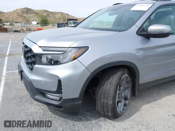 2023 Honda Passport EX-L with VIN 5FNYF8H53PB034963, listed as a IAAI auction lot 41686154 with 12,572 mi miles and . Bid and sale history available at carsss.com. Image 6.
