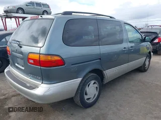 1999 Toyota Sienna LE with VIN 4T3ZF13C2XU136847, listed as a IAAI auction lot 41663608 with 178,581 mi miles. Bid and sale history available at carsss.com. Image 4.