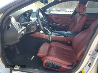 2015 BMW 6 Series 640i xDrive z VIN WBA6B8C53FD453909, wystawiony jako Copart lot #55292765 z przebiegiem 84 971 mil mil oraz Szkoda całkowita • Salvage title. Historia ofert i sprzedaży dostępna na DreamBid. Obrazek 7.