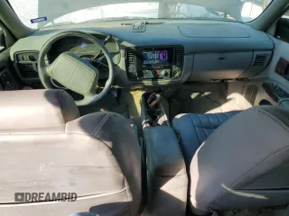 1996 Chevrolet Caprice with VIN 1G1BL82P2TR106404, listed as a Copart auction lot 74213214 with 156,588 mi miles and Salvage title. Bid and sale history available at DreamBid. Image 8.