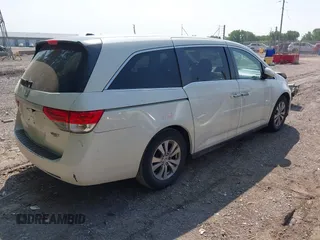 2014 Honda Odyssey EX-L with VIN 5FNRL5H63EB131596, listed as a IAAI auction lot 42402427 with 106,156 mi miles and . Bid and sale history available at DreamBid. Image 4.