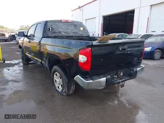 2014 Toyota Tundra 4WD Truck SR with VIN 5TFUW5F1XEX377799, listed as a IAAI auction lot 41889381 with 225,551 mi miles. Bid and sale history available at carsss.com. Image 3.