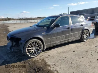 2002 BMW 3 Series 330xi with VIN WBAEW53412PG09026, listed as a Copart auction lot 89108295 with 106,516 mi miles and Salvage title. Bid and sale history available at DreamBid. Image 1.