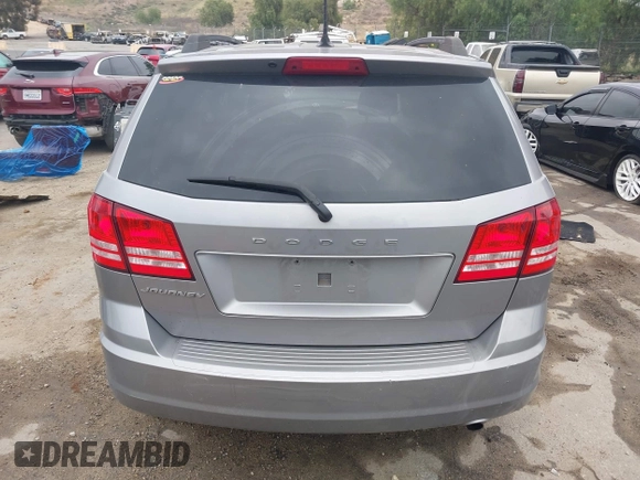 2018 Dodge Journey SE with VIN 3C4PDCAB1JT141295, listed as a IAAI auction lot 42098218 with 110,691 mi miles. Bid and sale history available at carsss.com. Image 16.