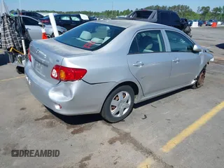 2009 Toyota Corolla with VIN 1NXBU40E99Z100681, listed as a IAAI auction lot 41973116 with 119,744 mi miles. Bid and sale history available at carsss.com. Image 4.