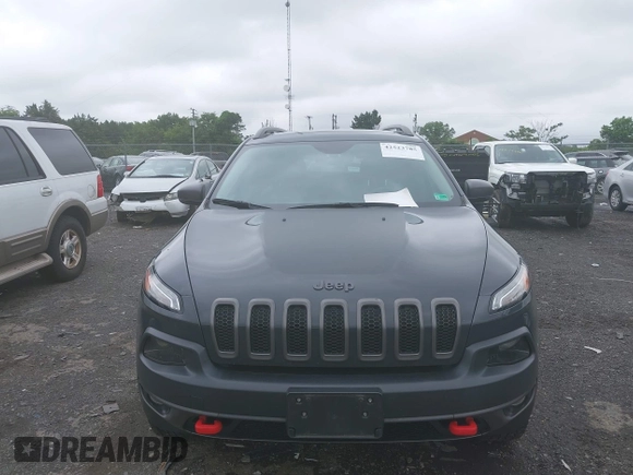 2017 Jeep Cherokee Trailhawk z VIN 1C4PJMBS2HW532974, wystawiony jako IAAI lot #42523785 z przebiegiem 74 272 mil mil oraz . Historia ofert i sprzedaży dostępna na DreamBid. Obrazek 6.