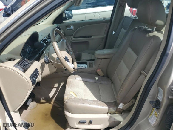 2006 Mercury Montego Premier with VIN 1MEFM42176G604087, listed as a Copart auction lot 74061984 with 0 mi miles and Salvage Title. Bid and sale history available at carsss.com. Image 7.