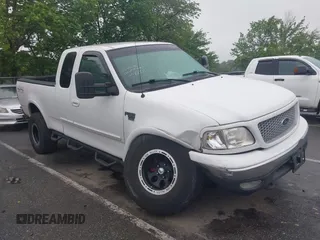1999 Ford F-150 with VIN 2FTRX18W3XCA86201, listed as a IAAI auction lot 42506999 with Not provided miles and . Bid and sale history available at DreamBid. Image 1.