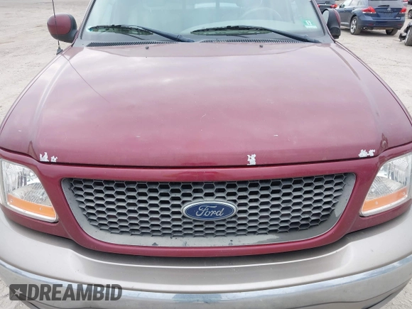 2003 Ford F-150 XL with VIN 1FTRX18L43NA96018, listed as a IAAI auction lot 41871947 with 208,517 mi miles. Bid and sale history available at carsss.com. Image 6.