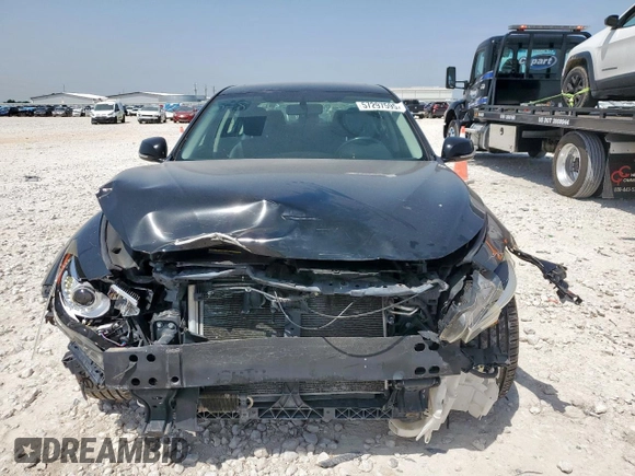 2015 Infiniti Q50 z VIN JN1BV7AR4FM423894, wystawiony jako Copart lot #57297595 z przebiegiem 82 593 mil mil oraz Szkoda całkowita • Salvage title. Historia ofert i sprzedaży dostępna na DreamBid. Obrazek 5.