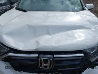 2022 Honda CR-V EX z VIN 7FARW2H50NE051609, wystawiony jako IAAI lot #42085067 z przebiegiem 29 316 mil mil oraz . Historia ofert i sprzedaży dostępna na DreamBid. Obrazek 10.