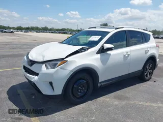 2018 Toyota RAV4 XLE with VIN 2T3WFREV9JW490324, listed as a IAAI auction lot 42298261 with 167,727 mi miles and . Bid and sale history available at DreamBid. Image 2.