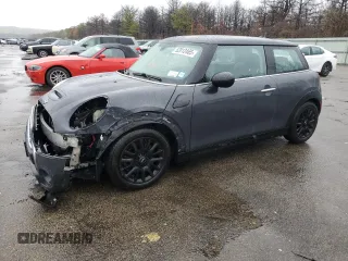 2014 MINI Hardtop S with VIN WMWXM7C54ET985344, listed as a Copart auction lot 52012465 with 87,017 mi miles and Salvage Title. Bid and sale history available at DreamBid. Image 1.