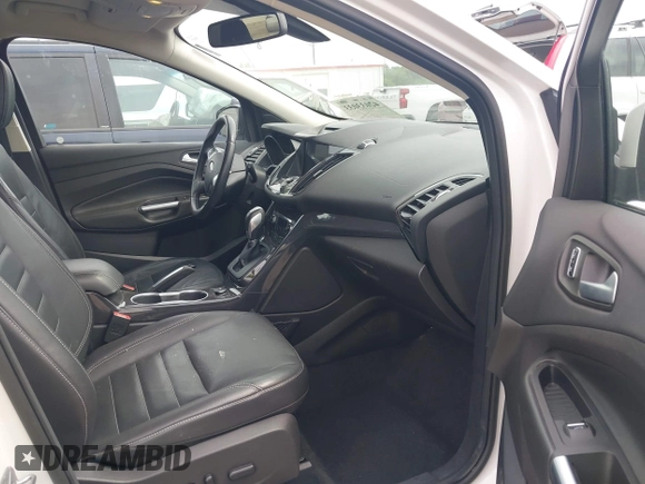 2016 Ford Escape Titanium with VIN 1FMCU9JX6GUB50226, listed as a IAAI auction lot 42033033 with 108,782 mi miles and . Bid and sale history available at DreamBid. Image 5.