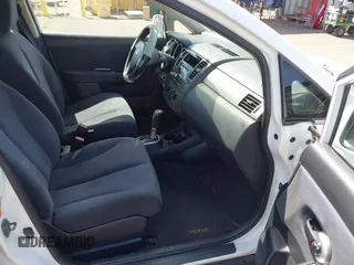 2009 Nissan Versa 1.8 S with VIN 3N1BC11E99L371998, listed as a IAAI auction lot 41723771 with 130,172 mi miles. Bid and sale history available at carsss.com. Image 5.