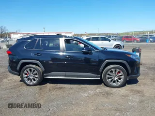 2021 Toyota RAV4 XLE Premium with VIN 2T3A1RFV6MC236809, listed as a IAAI auction lot 42056379 with 99,921 mi miles and . Bid and sale history available at DreamBid. Image 13.