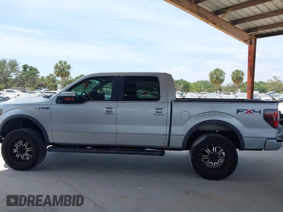 2011 Ford F-150 XL with VIN 1FTFW1EF3BFC70397, listed as a IAAI auction lot 42102868 with 149,616 mi miles. Bid and sale history available at carsss.com. Image 14.