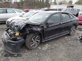 2021 Volkswagen Jetta GLI S with VIN 3VW6T7BU3MM052765, listed as a IAAI auction lot 41908512 with 53,000 mi miles and . Bid and sale history available at DreamBid. Image 2.