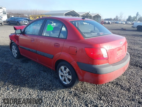 2009 Kia Rio LX with VIN KNADE223796485606, listed as a IAAI auction lot 41676881 with 58,852 mi miles and . Bid and sale history available at DreamBid. Image 3.
