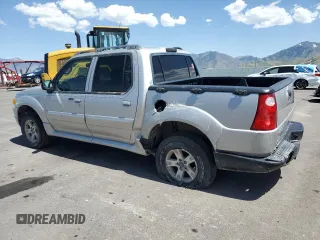 2005 Ford Explorer Sport Trac XLS with VIN 1FMZU77K25UA07118, listed as a Copart auction lot 54267095 with 170,197 mi miles and Salvage title. Bid and sale history available at DreamBid. Image 2.