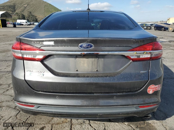 2018 Ford Fusion Energi SE with VIN 3FA6P0PU2JR218527, listed as a Copart auction lot 47657745 with 67,317 mi miles and Salvage Title. Bid and sale history available at carsss.com. Image 6.