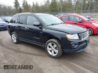 2013 Jeep Compass Latitude with VIN 1C4NJDEB2DD280393, listed as a IAAI auction lot 42028703 with 148,766 mi miles. Bid and sale history available at carsss.com. Image 1.
