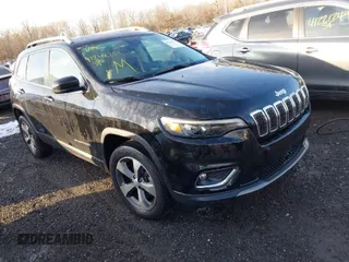 2021 Jeep Cherokee Limited z VIN 1C4PJMDX8MD108052, wystawiony jako IAAI lot #41248255 z przebiegiem 131 929 mil mil oraz . Historia ofert i sprzedaży dostępna na DreamBid. Obrazek 1.