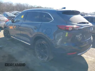 2021 Mazda CX-9 Grand Touring with VIN JM3TCBDY1M0505302, listed as a IAAI auction lot 41649151 with 67,183 mi miles and . Bid and sale history available at carsss.com. Image 3.