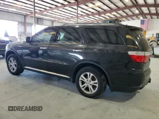 2013 Dodge Durango Crew with VIN 1C4RDHDG5DC617402, listed as a Copart auction lot 58056795 with 180,990 mi miles and Salvage title. Bid and sale history available at DreamBid. Image 2.