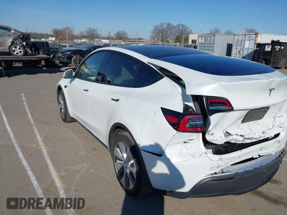 2023 Tesla Model Y Long Range with VIN 7SAYGDEE5PA094253, listed as a IAAI auction lot 41701966 with 29,458 mi miles and . Bid and sale history available at DreamBid. Image 3.