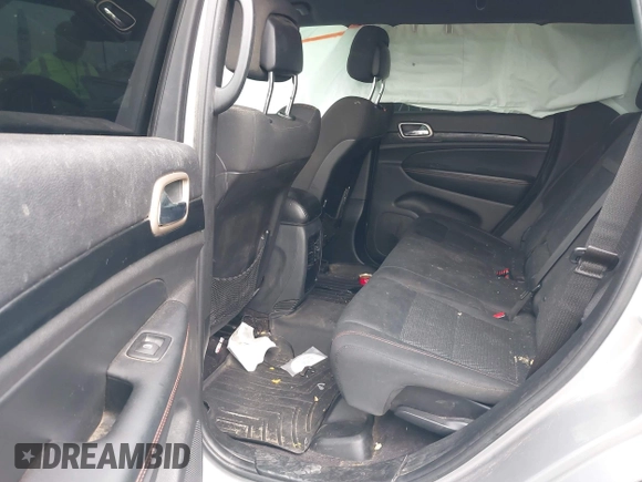 2016 Jeep Grand Cherokee Laredo z VIN 1C4RJFAG3GC457431, wystawiony jako IAAI lot #41993167 z przebiegiem 61 427 mil mil oraz . Historia ofert i sprzedaży dostępna na DreamBid. Obrazek 8.