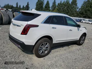 2023 Cadillac XT5 AWD Premium Luxury with VIN 1GYKNDR4XPZ187495, listed as a Copart auction lot 65627993 with 8,978 mi miles and . Bid and sale history available at DreamBid. Image 3.