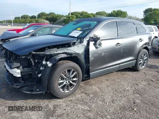 2020 Mazda CX-9 Touring z VIN JM3TCACY5L0412308, wystawiony jako IAAI lot #41208401 z przebiegiem 37 029 mil mil oraz . Historia ofert i sprzedaży dostępna na DreamBid. Obrazek 2.